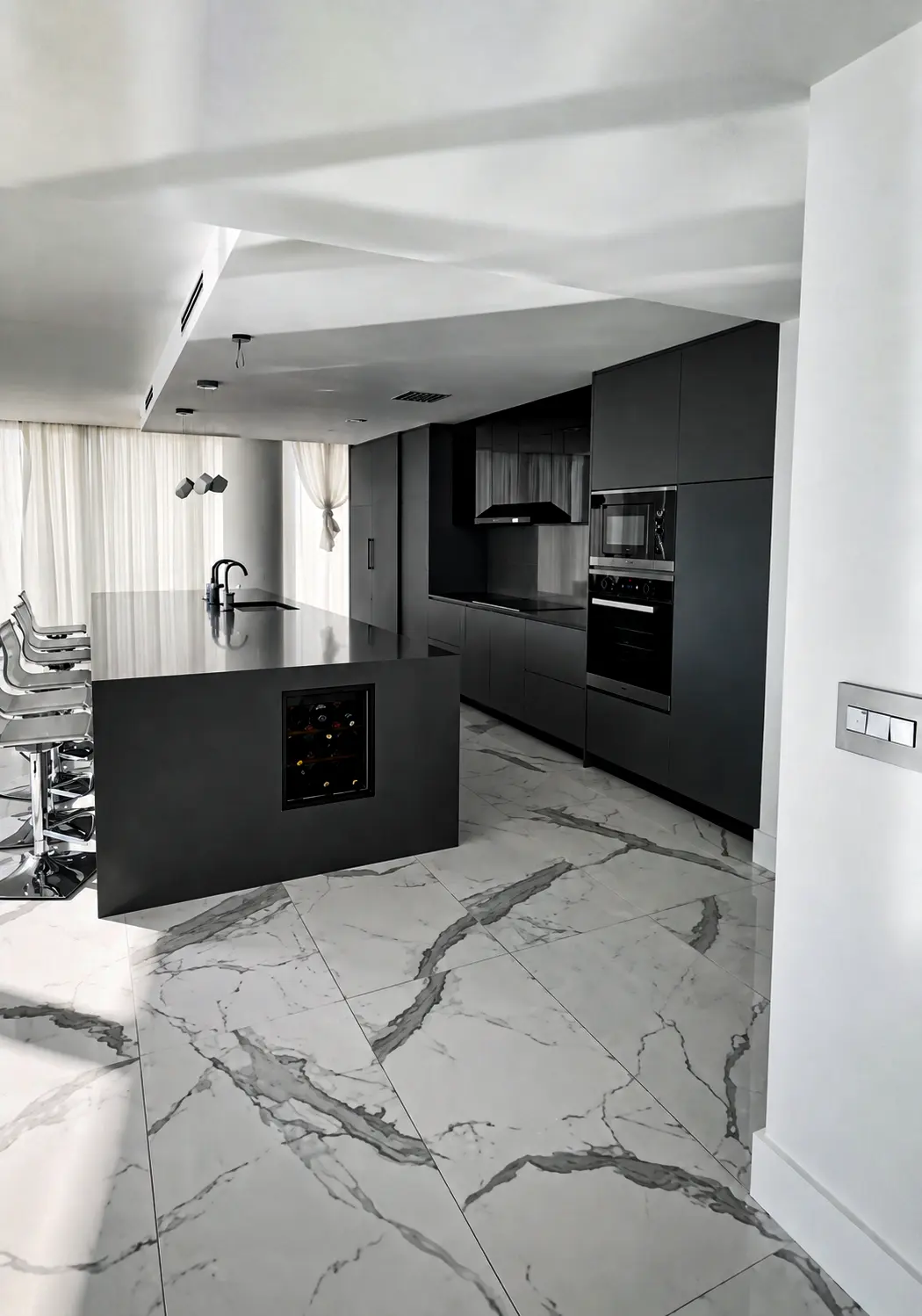 All-black modern kitchen island with wine cooler and marble floor in Fort Lauderdale, FL
