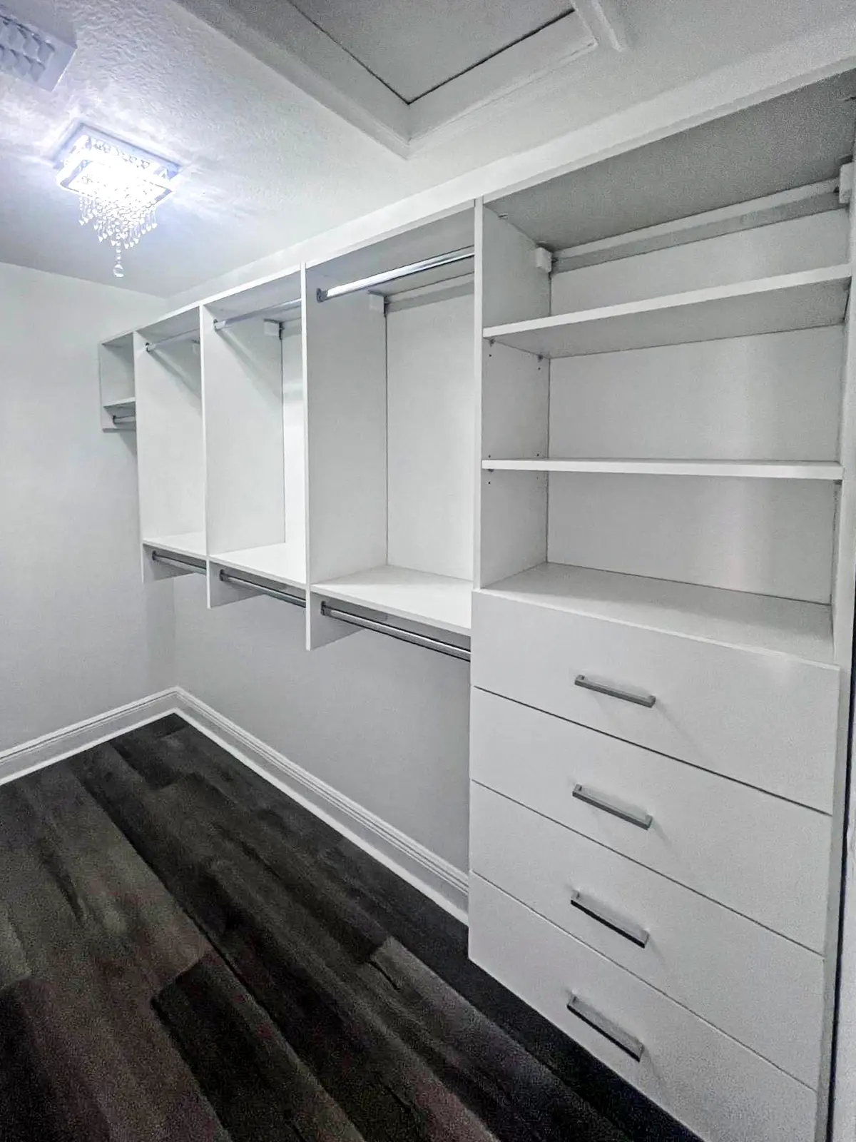Triple-Hang Reach-In Closet with open shelving in Boca Raton, FL