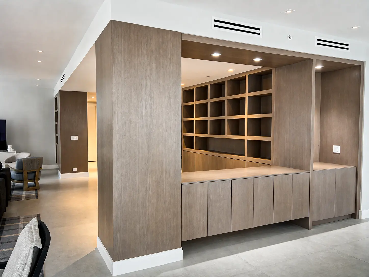 Custom oceanview home office nook with built-in desk and shelving in Fort Lauderdale, FL
